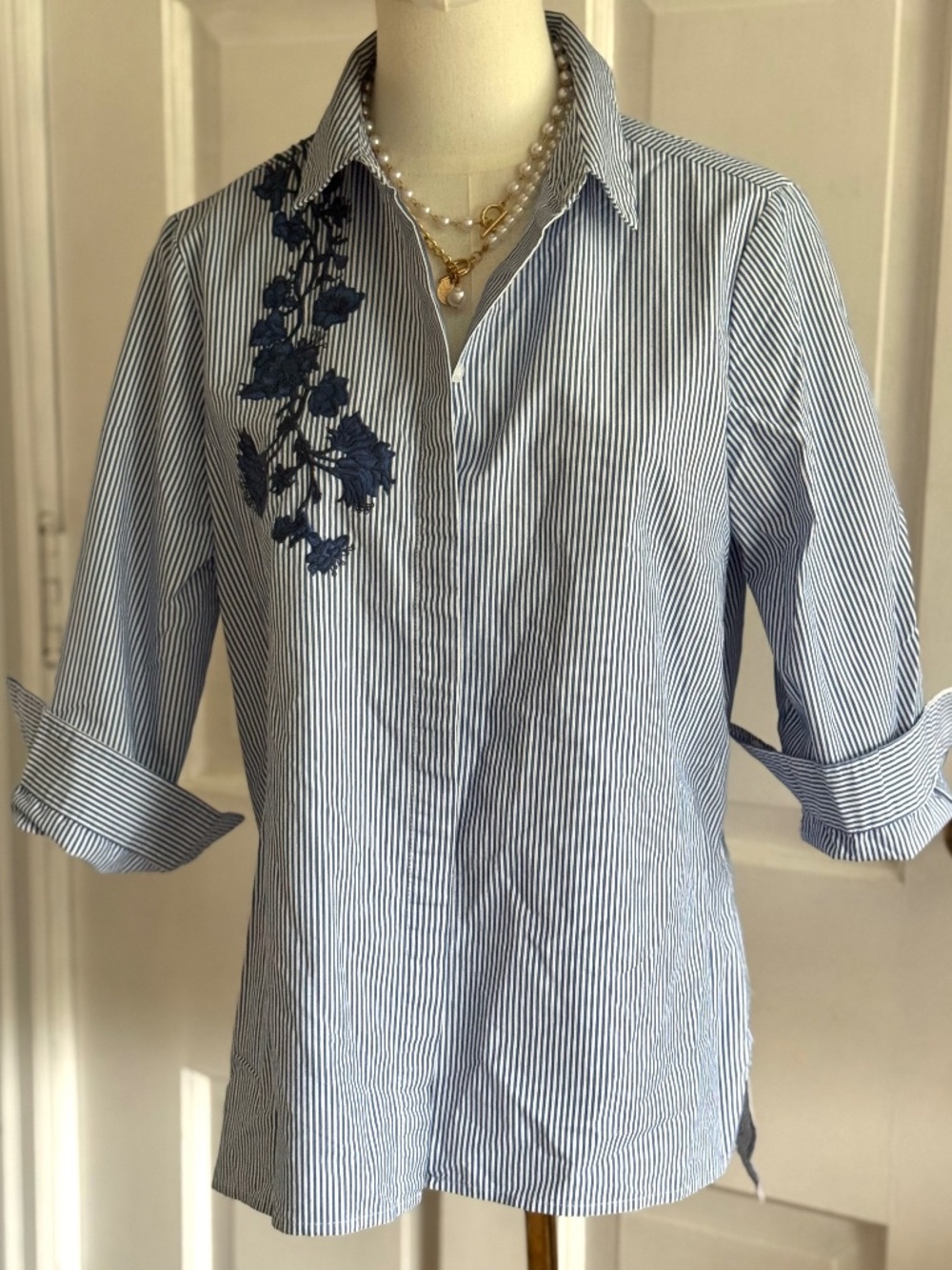 Blue striped shirt with embroidery